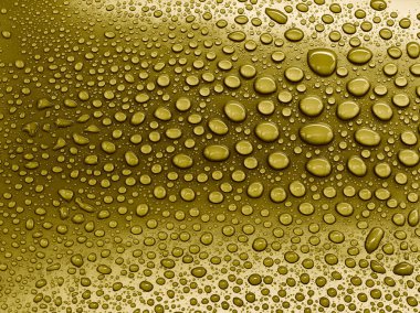Sarı arkaplanda su damlaları.