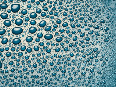 Mavi Arkaplanda Su Damlaları.