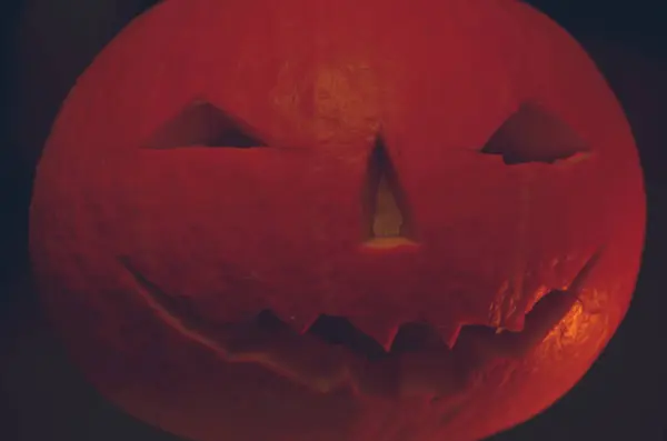 Scary face carved on pumpkin — Stock Photo, Image