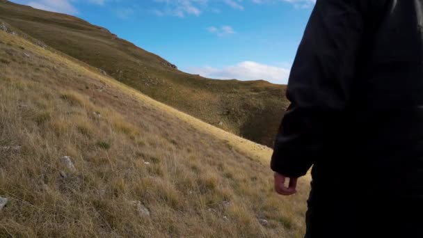 Man Goes Steep Slope Dry Grass Wind Vlasic Mountain Bosnia — Stock Video