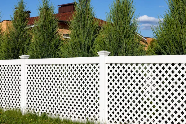 White Vinyl Fence Cottage Village Tall Thuja Bushes Fence Fencing Stock Picture