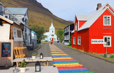Beautiful painted pavement of Seydisfjordur resort in East Iceland, Europe