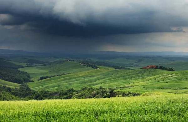 Summer cloudy landscape of Tuscany landscape, Italy
