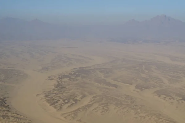 Aerial view of Egypt desert, mountains and sky