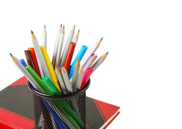 Color pencils, felt-tip pens, brushes and pens over notebook isolated on white with space for text — Stock Photo, Image