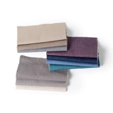 Topçu Tekstil örnekleri parlak topluluğu. Kumaş doku arka plan.