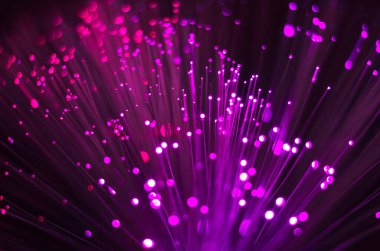 Bulanık pembe ve mavi Bokeh ışıkları. Fiber optik çözünmüş arka plan. Tasarımın için arkaplan