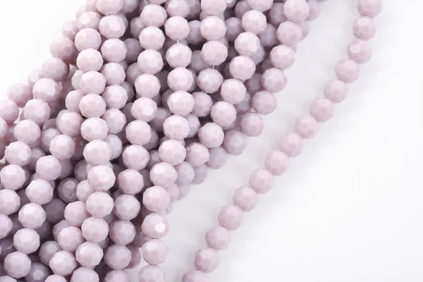 Beautiful Light Purple Glass Sparkle Crystal Isoelevated Beads White Background — стоковое фото