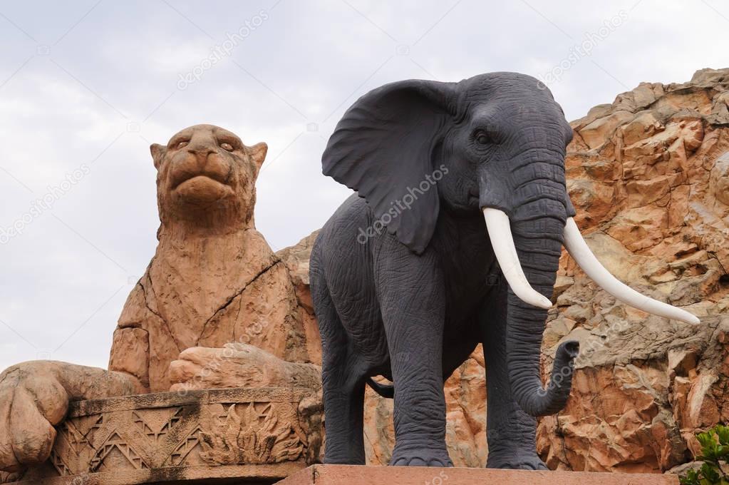 Elephant and tiger statues on the Bridge of Time, Sun City resor