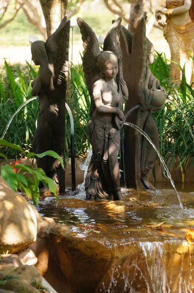 Statues of Thai angel in the garden,Thailand.