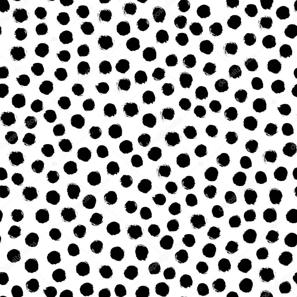 Seamless polka dot pattern hand drawn with a brush. Vector Monochrome Grunge texture of circles.