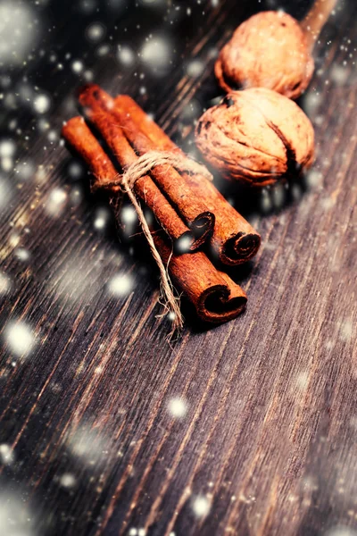 Winter spices over wooden background — Stock Photo, Image