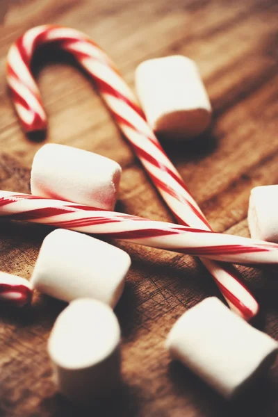 Candy canes with white marshmallows — Stock Photo, Image