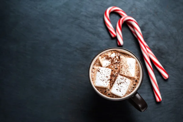 Hot Chocolate with marshmallows and candy sticks — Stock Photo, Image