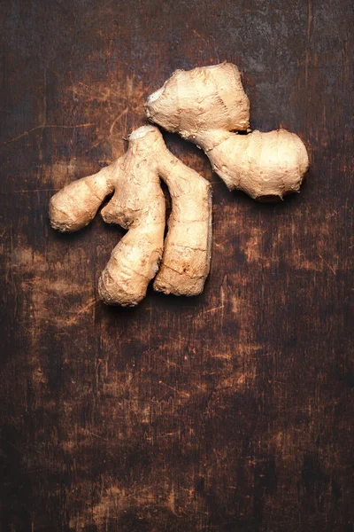 Ginger root on wooden table — Stock Photo, Image