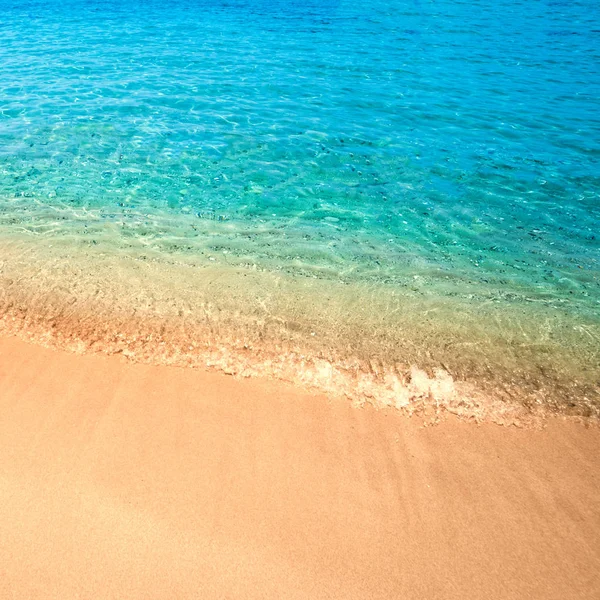 Vakkert hav og sand – stockfoto
