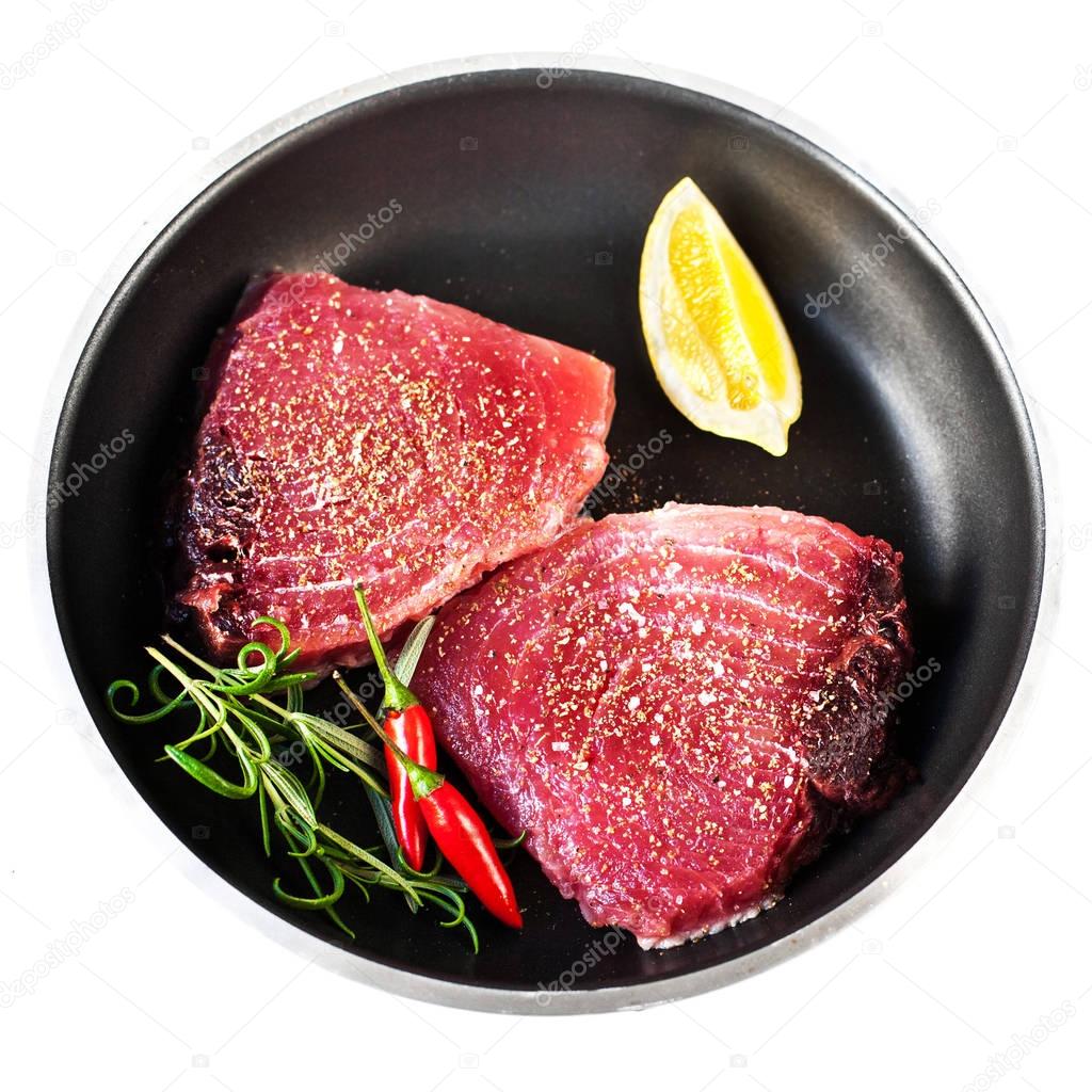 tuna fillet with herbs, salt and lemon  