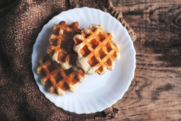 Plate of  belgian waffles with icing sugar — Stock Photo, Image