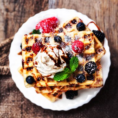 Belgian waffles with mint leaves
