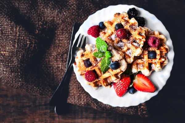 Belgian waffles with mint leaves — Stock Photo, Image