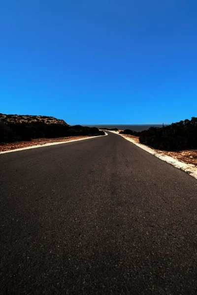 Svart asfalt vägen liggande scenen — Stockfoto