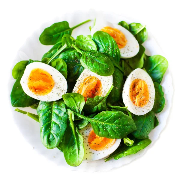 Spinat und gekochte Eier — Stockfoto