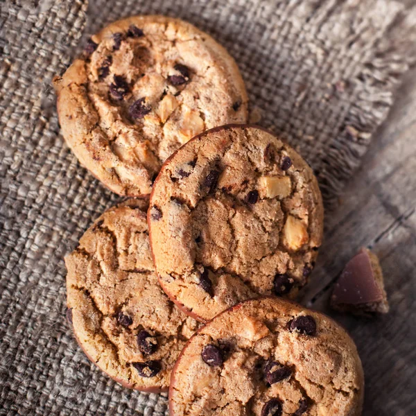 Chocolate cookies on dark napkin — Stock Photo, Image