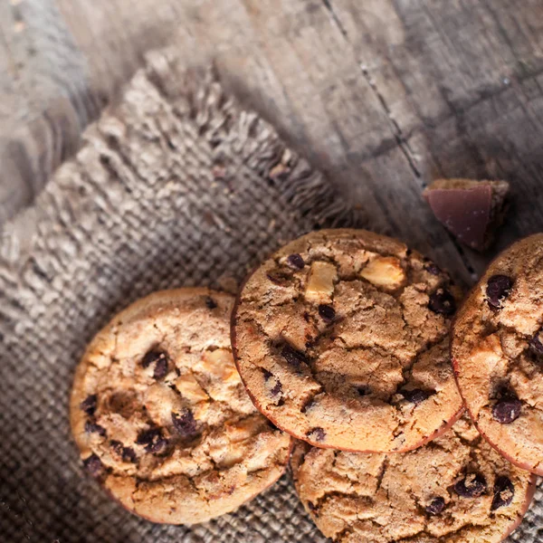 Chocolate cookies on dark  napkin — Stock Photo, Image