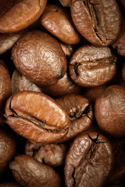 Granos de café macro fondo de pantalla . —  Fotos de Stock