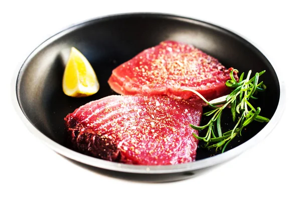 Raw tuna on a frying pan — Stock Photo, Image