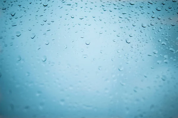 Gotas de chuva no vidro da janela — Fotografia de Stock