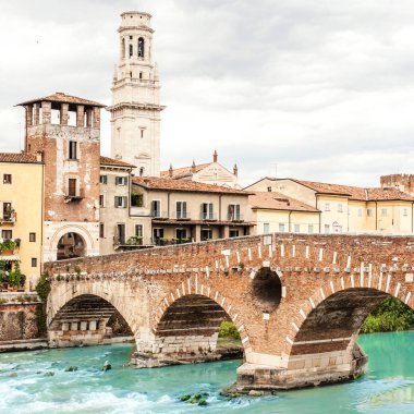VERONA, ITALY - June 25, 2017:  Verona.  Bridge Ponte Pietra in Verona on Adige river clipart