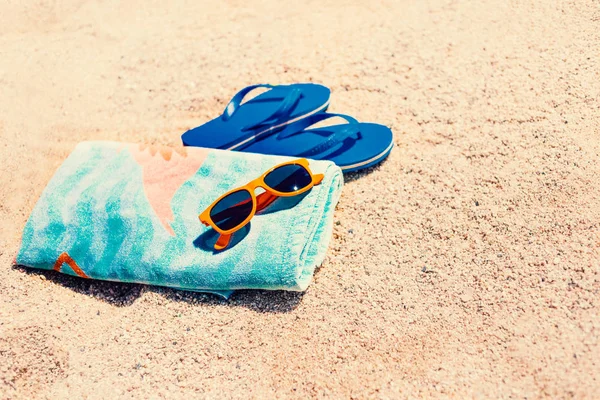 Blue Sandal Flip Flop Sunglasses Towel Yellow Sand Summer Fun — Stock Photo, Image