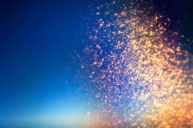 Parlak ışıklar ışıltı stardust ile arka plan soyut