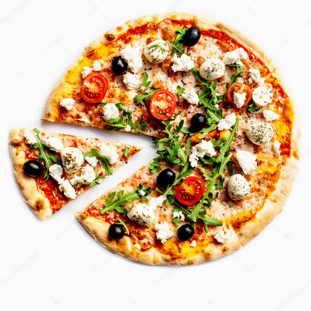 Italian pizza with soft cheese and green arugula isolated on white background