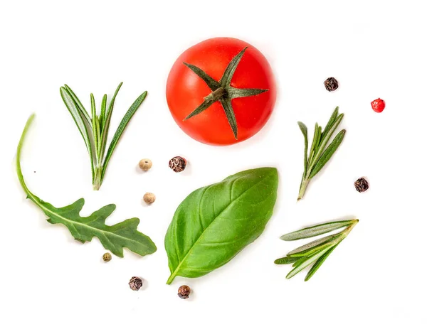 Tomato, arugula and basil leaf isolated on white background, top view. Creative layout with fresh organic vegetables and spices. Flat lay. Food concept — Stock Image Tomato Arugula Basil Leaf Isolated White Background Top View Creative Stock Photo