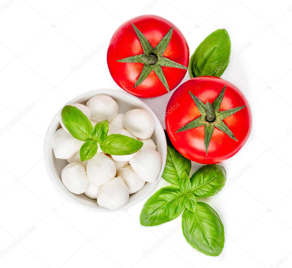 Top view of mozzarella, tomatoes and basil leaves isolated on white background