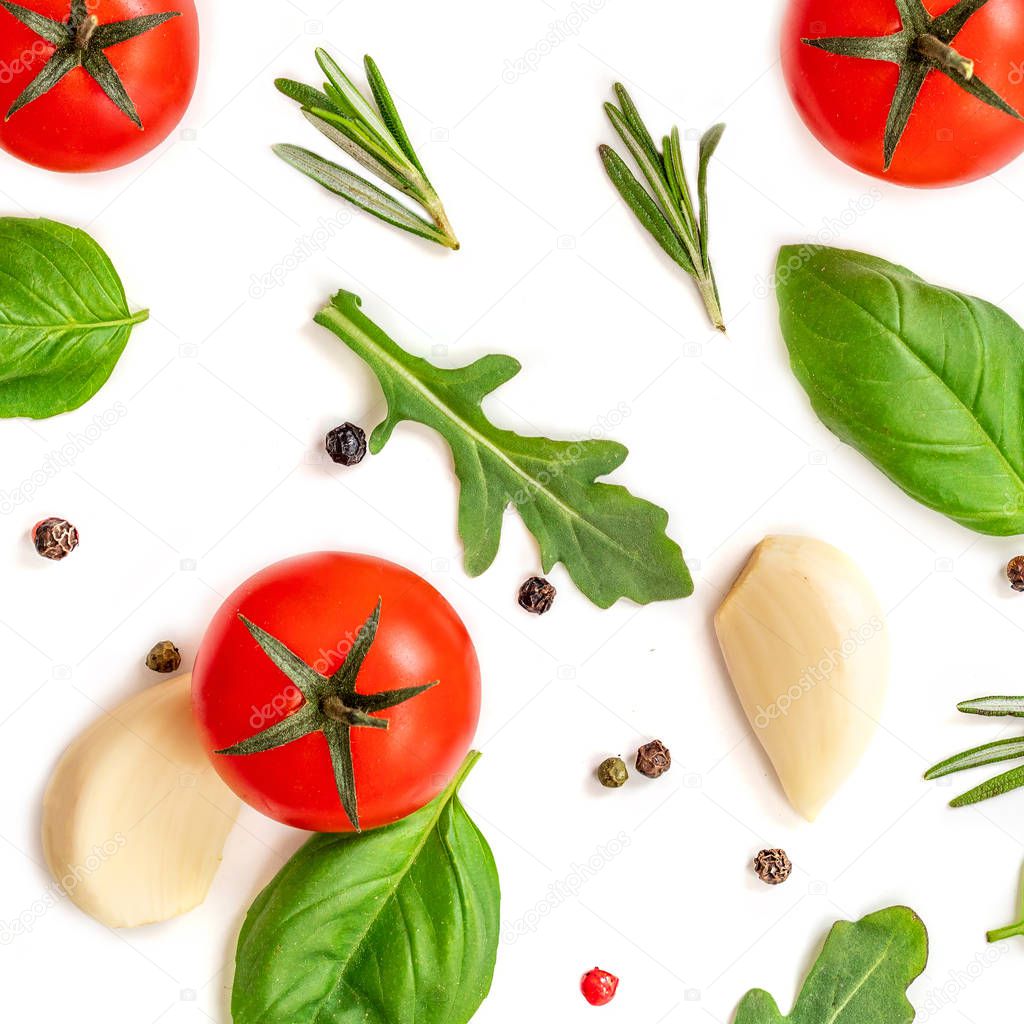 Creative food pattern with fresh vegetables, herbs and spices isolated on white background