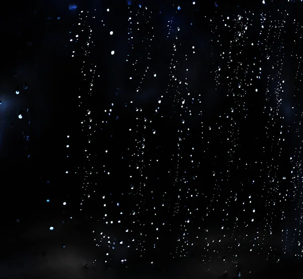 Rain water drops on a black dramatic window glass. Autumn  depre — 스톡 사진