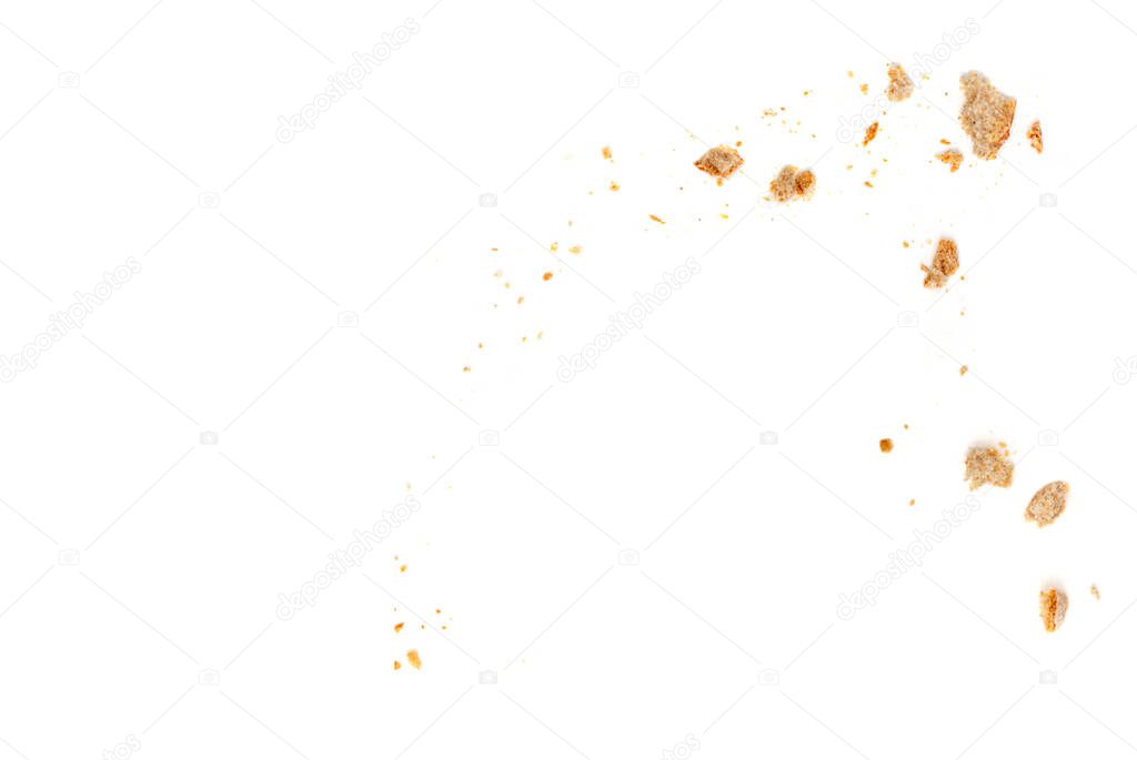 Bread slices and crumbs isolated on white background. Top vie