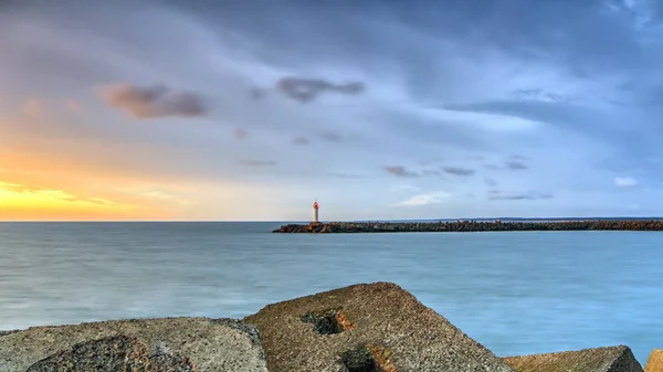 Zonsondergang bij de pier — Stockfoto