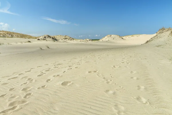 Blauwe hemel en zand — Stockfoto