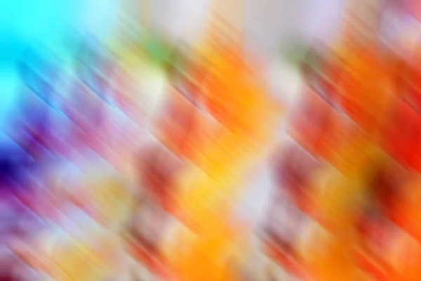 Mehrfarbige bunte verschwommene Farbverlauf Hintergrund. rot, orange, grün, gelb, lila, blau gemischte Bewegungsstruktur — Stockfoto
