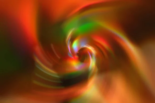 Colorato sfumato gradiente spirale vortice sfondo. Texture multicolore mista arancione, verde, gialla, rossa — Foto Stock