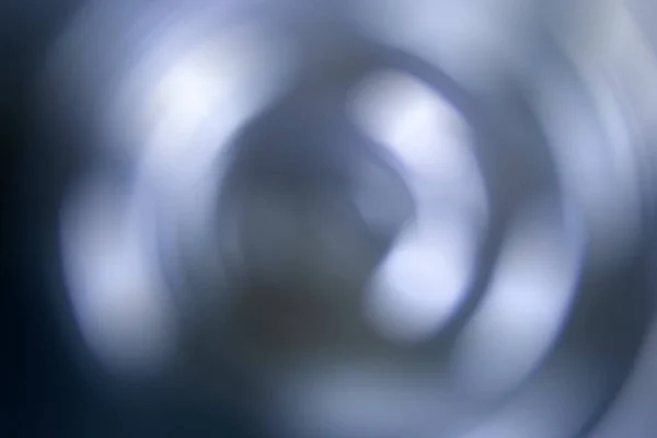 Розмитий радіальний градієнт синьо-сірого фону. Змішана кругла текстура — стокове фото