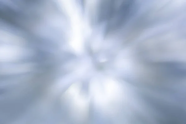 Luces borrosas fondo blanco, gris, azul. Efecto de explosión suave abstracto. Patrón de movimiento centrado — Foto de Stock