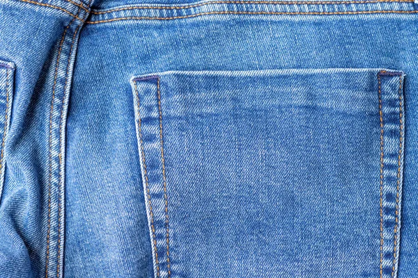 Textura Tejido Jeans Azul Brillante Fondo Mezclilla Con Bolsillo Trasero — Foto de Stock