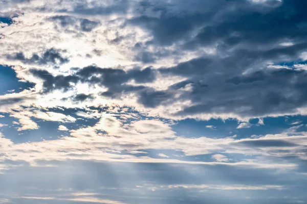 sky with clouds and sun rays