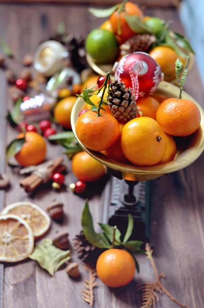 Vintage decorativo Natal frutas tangerinas — Fotografia de Stock