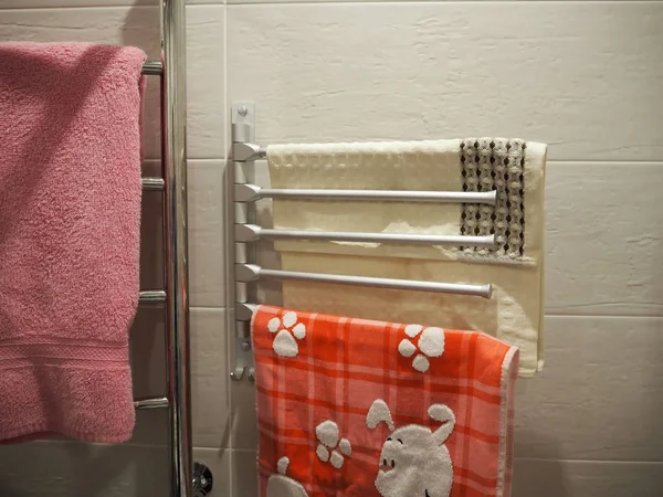 Towel rack in the bathroom interior.